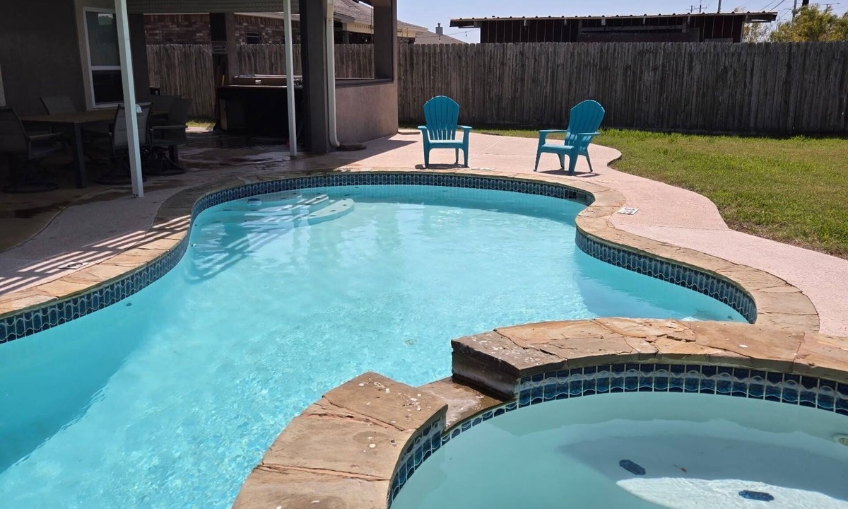 South Side House | A family-friendly retreat featuring a pool, hot tub, and spacious outdoor area.