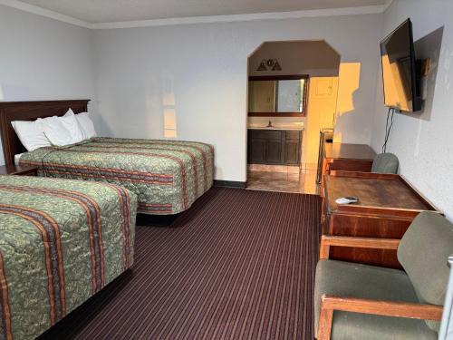 Many Hotel | American Inn Motel