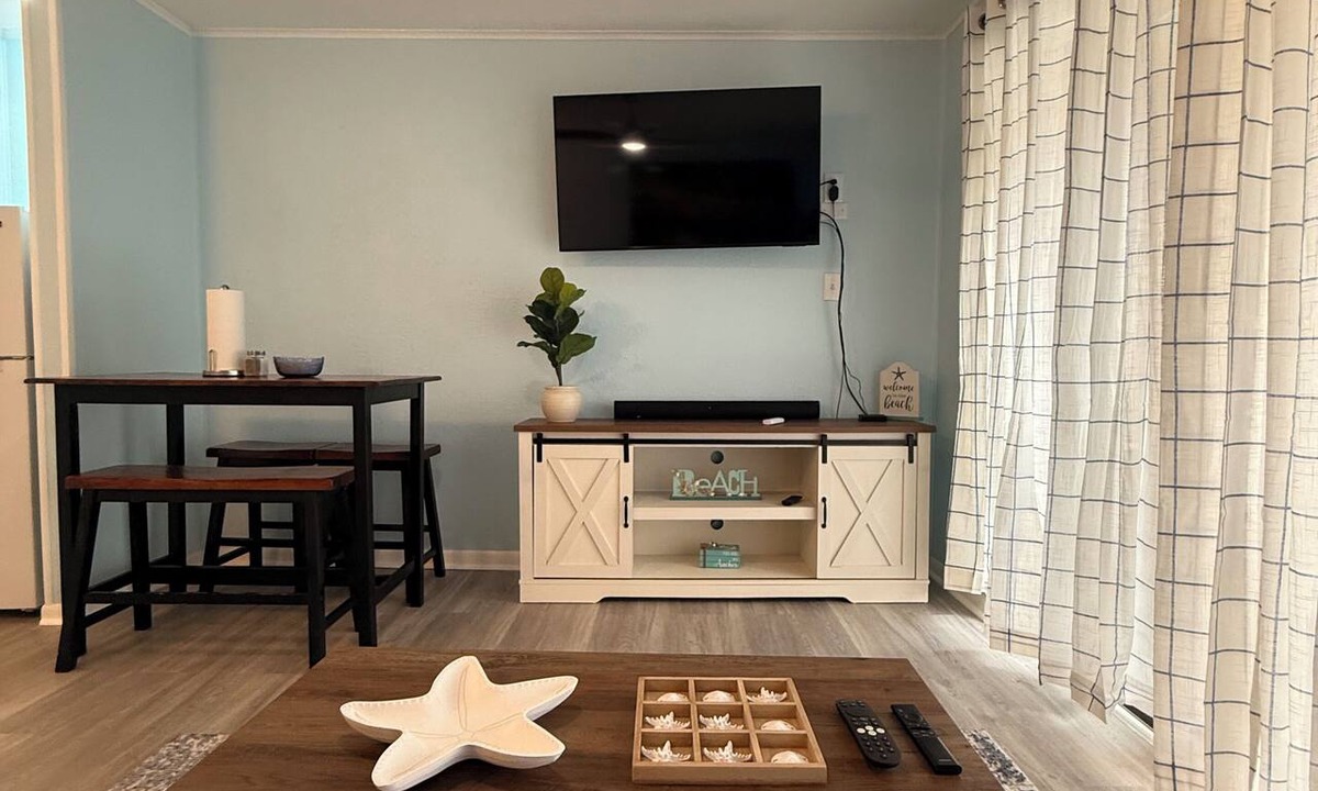 North Beach Condo | Beachside escape at Villa Del Sol—steps away to sand, pool, Aquarium & USS Lex.