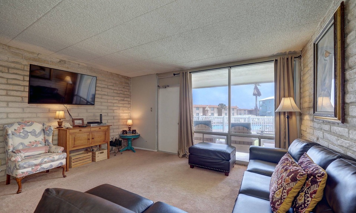 Shibui Sands Condo | Cozy efficiency condo Coral Cay #107, poolside in Port Aransas, perfect for couples.
