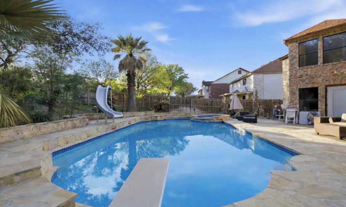 Wetmore House | Heated Pool, Hot Tub & Huge Backyard. Spacious Family Getaway 20 Minutes from DT
