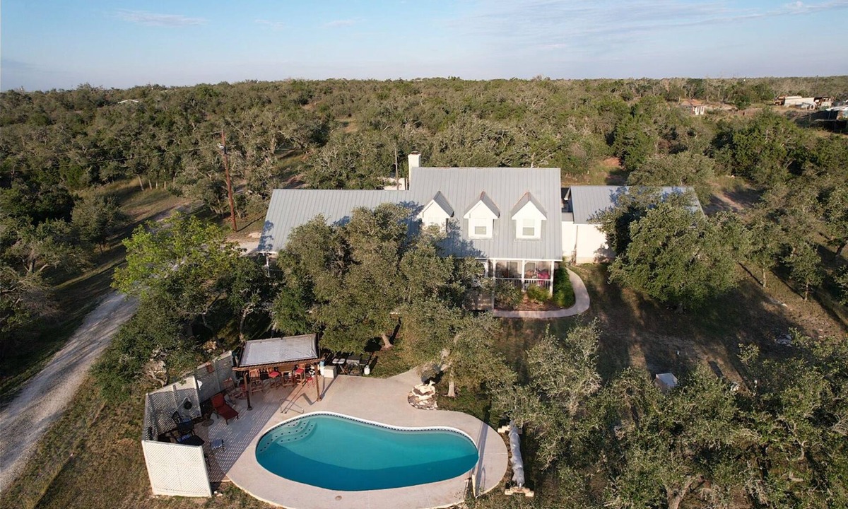 Harper House | Howl Haus Hideaway, with relaxing pool.