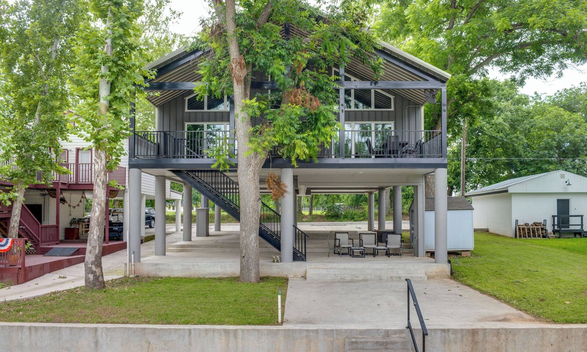 McQueeney House | Outdoor Entertainment Space: Home in McQueeney