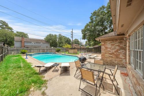 FM 1960 House | Pool Paradise Game Tables Sleeps 16 Grill