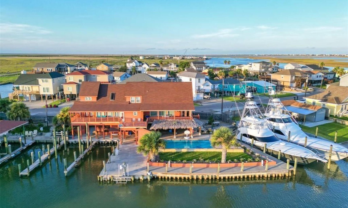 Surfside Beach House | Private swimming pool, fishing dock! Something to offer everyone!