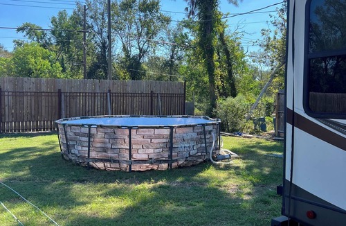 Northside RV Rental | 2-bedroom campground in amazing Houston with cool AC breeze pond with fishing