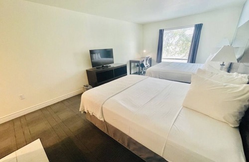 Cuero House | 2 Double Queen Rooms at FairBridge Inn & Suites Cuero, Pets Are Welcome!