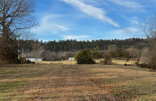 Centerville RV Rental | 2024 Total Eclipse RV site at the base of Petit Jean Mountain