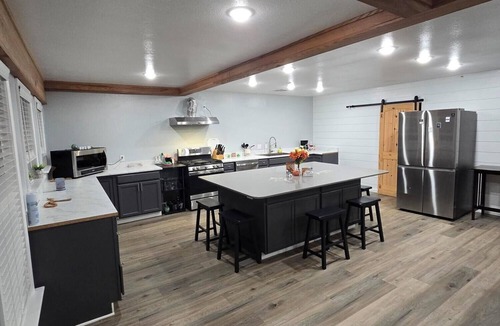 Golden Meadow Cabin | 4-bedroom lodge with waterside access and a great balcony view. Enjoy your stay