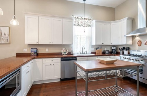 West Riverside House | 4BR Luxury Uptown Retreat w/Private Heated Pool