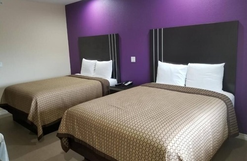 Bay City Hotel | Affordable Room Perfect for Families, Equipped w/Kitchenette and Large Bathroom