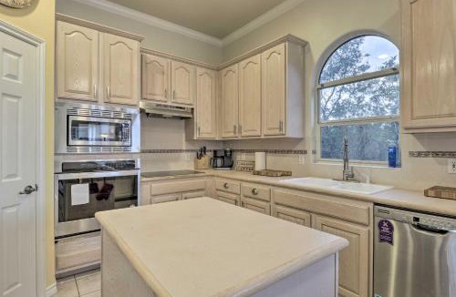 Travis Landing Villa | Airy Villa in Austin w/Badminton/Volleyball Court