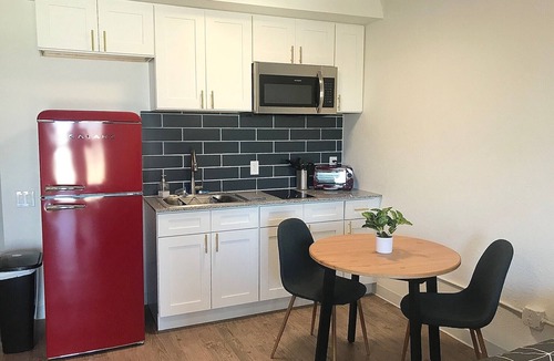 St. Johns Apartment | All Inclusive Studio that can sleep up to 4 people! Pool, Gym & Laundry onsite.