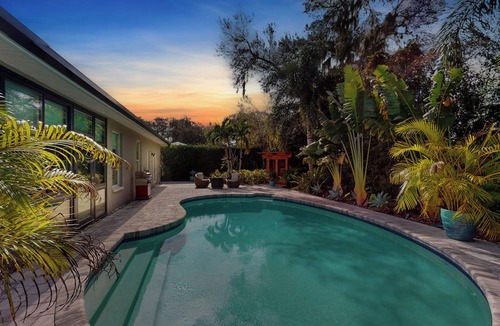 Boyette Springs House | Backyard oasis w/pool, sauna & fire pit