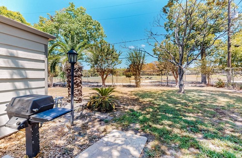 La Porte House | Bay Harbor Beauty | House in La Porte with yard and fireplace - close to beaches