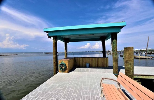 Grand Isle Condo | Baywinds condo #9: Spacious 4BR waterfront retreat in Grand Isle, LA. - Coastal Realty Group