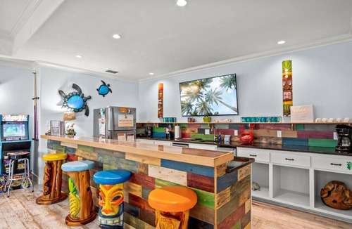 Sand Point House | “Beach Views—Shell Yeah! Beach House is your stylish, fun-filled coastal escape with private bathrooms & neighborhood pool-Just steps from the sand!”