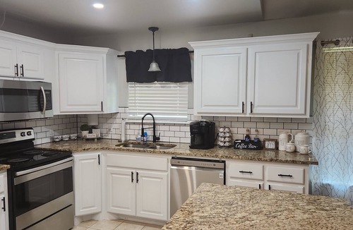 Longtown House | Beautiful Lake Front home w/sunroom and outdoor patio,