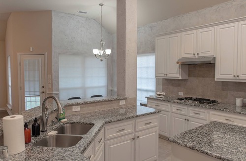 DeSoto House | Bright and spacious 4-bedroom, 2.5-bath DeSoto home featuring 1 king, 3 queen, 1 full, and 1 twin bed. Perfect for families and groups, offering comfort, modern design, and a relaxing stay near Dallas, shopping, and dining.