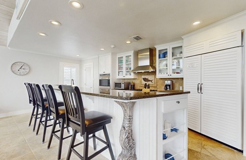 Key Allegro House | Canal-front home with saltwater pool, pool spa, kayaks, dock, & casita