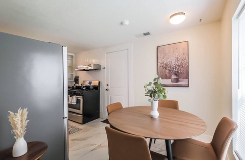Shady Acres House | Charming 2-story private home sleeps 8 in the Heights with fast WiFi, smart TVs, ample parking, and a fenced patio + yard. Features a primary queen ensuite and quick access to Downtown.