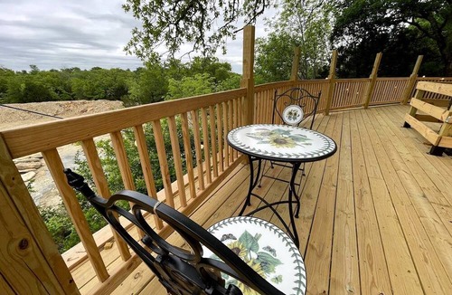 Mineral Wells House | Charming Conestoga Wagon Rental for Unforgettable Glamping in Mineral Wells, Texas