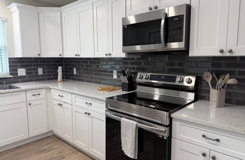 Lumberton House | Charming Newly Renovated 2BR Farmhouse on 1 acre with Covered Parking and Wi-Fi.