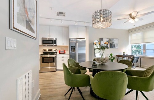 Central Business District Hotel | Chic Elegance in the Heart of NOLA: 4-Bedroom Oasis Awaits!