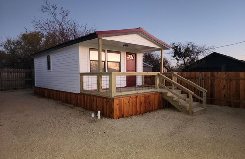 Breckenridge Apartment | Cozy 1 room tiny home studio in lovely Breckenridge with covered front porch!