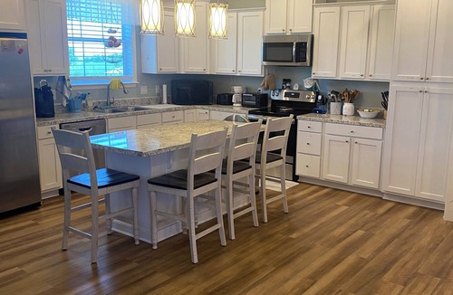 Kaplan Cabin | Cozy 3-bedroom lodge in tranquil Pecan Island with AC comfort.