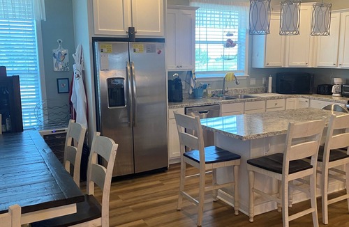 Kaplan Cabin | Cozy 3-bedroom lodge in tranquil Pecan Island with AC comfort.