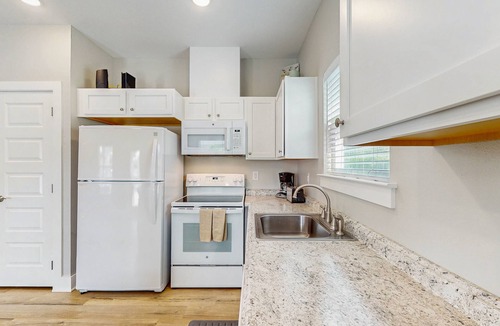Fulton House | Cozy coastal home with shared pool, stocked fishing pond - patio & BBQ