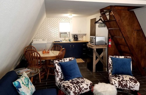 Cisco Cabin | Cozy Lakefront A-Frame Cabin with Dock Access & BBQ Near Lake Cisco, TX