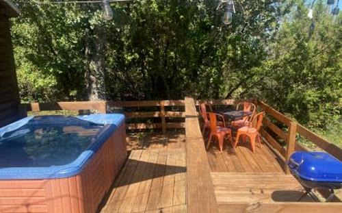 Paluxy House | Cozy Texas Cabin Retreat with Hot Tub & Scenic Outdoor Spaces in Bluff Dale, Texas