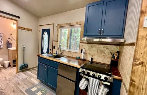 Boles Cabin | Cozy Tiny Cabin with Porch & Fire Pit near Scenic Trails in Western Arkansas