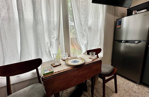 Northwest Dallas Cabin | Dallas Guest House | Monthly Stays | Near Love Field | Shared Outdoor Kitchen