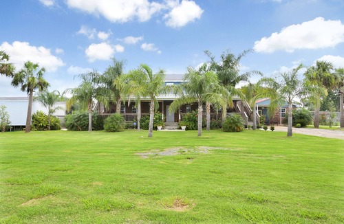 Boothville-Venice House | EXCEPTIONAL EXCLUSIVE ONE-OF-A-KIND 5 BEDROOM 5 BATH LODGE IN VENICE