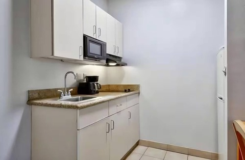 Sulphur Apartment | Family Suite | 2 Full Beds & Kitchenette | Smoke Free
