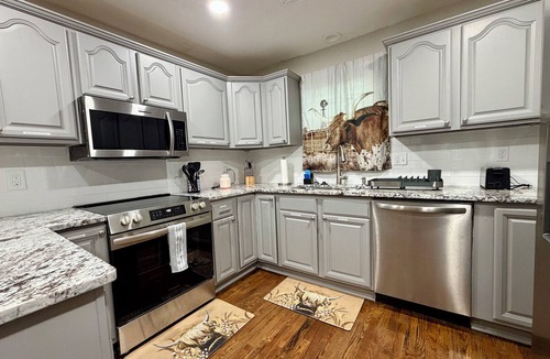 Lawton House | Fun, entertaining home with game room near Fort Sill, restaurants, & shopping.