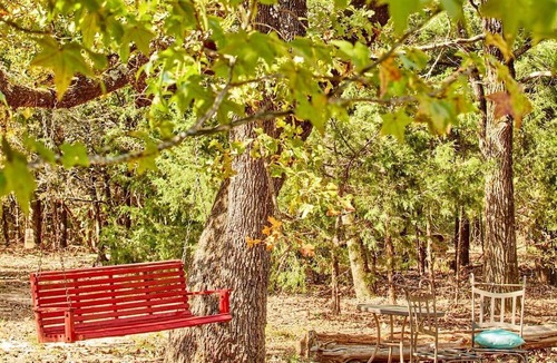 Van Zandt County Cabin | Gorgeous Multi-Unit Cabin Rental for Larger Groups Nestled in the Trees for an Unforgettable Getaway in Nature in Ben Wheeler, Texas