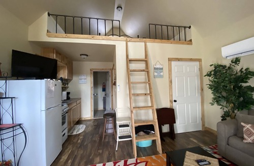 Winslow House | Grandma's cabin nestled in a little woodland village – playground, pond and more