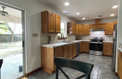 Covington House | Hip Hornsby House-central location, fenced lg. yard, garage, patio