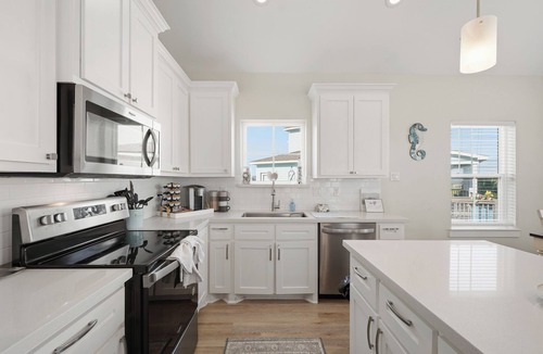 Pointe San Luis House | House listing with beautiful bay views, walking distance to pool and beach