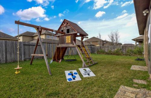 Barker House | HTown Getaway Air Hockey Gym Yard BBQ Swing Set