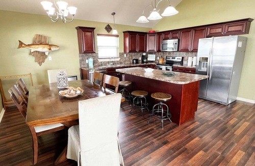 Golden Meadow House | Knot Workin - Boat Access - Island Realty