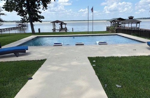 Lake Houston House | Lakehouse…Pool and Hottub. Waterfront property with boat dock.