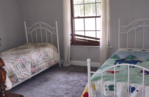 Linden Other | Large, open format farmhouse set back with 100 acres of prime hunting/fishing.