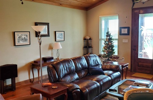 Hackberry House | Lovely 4-bedroom elevated house with Front and Back Porches, on a canal