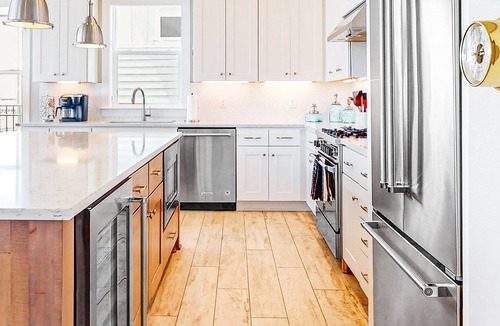 Rockport House | Luxury bayfront home with plunge pool, outdoor kitchen, docks, kayaks & SUPs