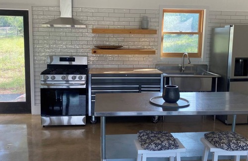 Dripping Springs House | Mid-Century Firehouse - Dripping Springs